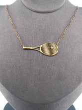 Load image into Gallery viewer, Diamond Tennis Ball Necklace Although delicate in looks - this necklace is light but strong! Each string is defined just like a racket - and the diamond ball shines brightly. Every piece is lovingly made in Los Angeles - and they are my exclusive design. Available in yellow or white gold - this choker is the best seller of all of my fine tennis jewel collection.