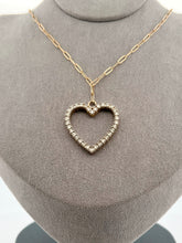 Load image into Gallery viewer, This luxurious necklace features a 1 inch gold heart covered in diamonds totalling over 1 karat. Displays beautifully on an elegant solid gold paper clip chain. By LOVE LOVE TENNIS