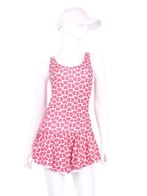 Load image into Gallery viewer, Super fun tiny heart print on this one! Let the Love Love flow! The Sandra Mee Dress offers a playful, fun, and very flirty look. Our dress is fitted, and flares out at the skirt with cute cut out ''O'' in the back. It is perfect for tennis, running and golf (with our Leg Lengthening Leggings), and of course, a trip to your after-court party with your friends. It was designed for confident women like you!
