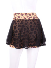 Load image into Gallery viewer, This Black Mesh Skirt Leopard LOVE "O" Skirt has shorties underneath and NO seams on the "O"! It's cut like a doughnut to show and move beautifully as you play. The fabric is uber soft and light - it dries quickly - and protects from UV rays too. This skirt has a “nearly naked” feel about it. All of the colors and patterns are LIMITED EDITION - once they are sold - we may or may not make them again exactly the same.