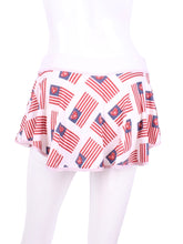 Load image into Gallery viewer, This “limited edition” art is the American Flag! It's so soft and flows on the Love "O" Skirt. The round skirt is cut like a donut with NO side seams! The waistband and shorties are white. Sizes: XS-XL