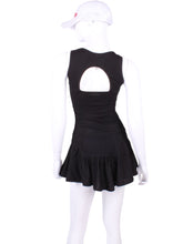 Load image into Gallery viewer, The Sandra Mee Dress offers a playful, fun, and very flirty look. Our dress is fitted, and flares out at the skirt with cute cut out ''O'' in the back. It is perfect for tennis, running and golf (with our Leg Lengthening Leggings), and of course, a trip to your after-court party with your friends. It was designed for confident women like you!
