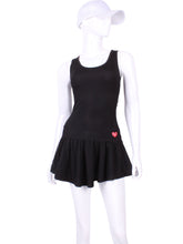 Load image into Gallery viewer, Sexy and soft black tennis dress to wear from the tennis court to cocktails because it's so elegant, comfortable and feminine.  Has a unique back tennis net pocket that holds two tennis balls, keeping them dry and behind you when you play.