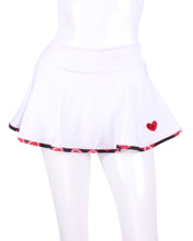 Load image into Gallery viewer, This gorgeous mini heart on off white LOVE "O" Skirt has shorties underneath and NO seams on the "O"! It's cut like a doughnut to show and move beautifully as you play. The fabric is uber soft and light - it dries quickly - and protects from UV rays too. This skirt has a “nearly naked” feel about it.