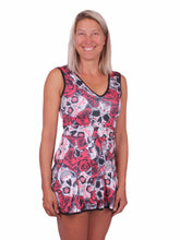 Load image into Gallery viewer, The Angelina Dress is modern yet classy.  This style is in our very limited Skull + Roses print, with a flattering vee style neck neckline.  This soft, silky, and sexy tennis dress has an empire waist and a feminine skirt.  With the exclusive dry ball back pocket - you don't need to tuck your tennis balls into your shorts anymore.    Designed by our Founder Adeline in Beverly Hills.  Sewn by our team in Downtown Los Angeles.
