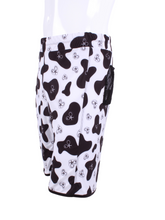 Load image into Gallery viewer, This is our limited edition Short Men’s Shorts in Cow Print. This piece has a silky and soft fabric. We make these in very small quantities - by design. Unique. Luxurious. Comfortable. Cool. Fun.