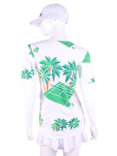 Load image into Gallery viewer, Palm Trees + Court Baggy Vee Tee. The very comfortable Baggy Vee Tee is so cool and easy to wear. For the lady that likes a little room when she plays - the feminine top is flowing in the air. This Palm Trees + Tennis Court on a white background has a white stripe down the sides, hem, collar, and cuff.