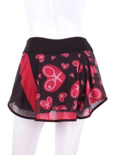 Load image into Gallery viewer, My all new Mondrian Mesh O Skirt - feminine, soft and very cool! Each skirt has soft shorties connected. The mesh makes it very light and airy and carries my TM logo of the heart and rackets! It is a little see through - allowing for the black shorties underneath to be seen a little.