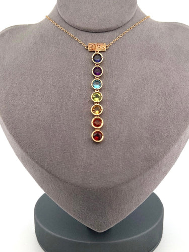 Elegant and timeless BLiSS by Adeline custom designed 7 Chakra necklace. The 4mm stones are:  Violet: Iolite Purple: Amethyst Blue: Aqua Marine Green: Peridot Yellow: Citrine Orange: Orange Sapphire Red: Garnet