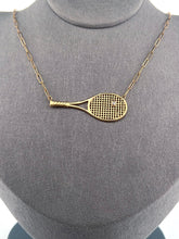 Load image into Gallery viewer, Diamond Tennis Ball Necklace Although delicate in looks - this necklace is light but strong!  Each string is defined just like a racket - and the diamond ball shines brightly.  Every piece is lovingly made in Los Angeles - and they are my exclusive design.  Available in yellow or white gold - this choker is the best seller of all of my fine tennis jewel collection.
