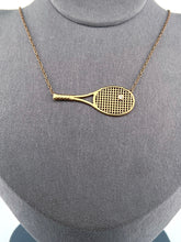 Load image into Gallery viewer, Diamond Tennis Ball Necklace Although delicate in looks - this necklace is light but strong!  Each string is defined just like a racket - and the diamond ball shines brightly.  Every piece is lovingly made in Los Angeles - and they are my exclusive design.  Available in yellow or white gold - this choker is the best seller of all of my fine tennis jewel collection.
