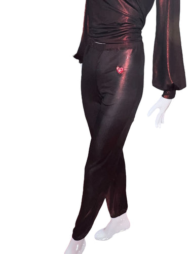 These pants are baggy and have a lose elastic on the waist allowing for comfort and the ability to pull them up or wear them low on the hips.  They are very light and roomy to allow for air flow.