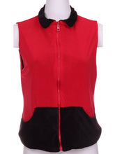 Load image into Gallery viewer, Our popular reversible vests can pair perfectly with any of our signature warm up pants! They are both soft and warm with pockets on both sides for your tennis balls.  This style is in our Black Velvet + Red design.  Machine wash cold and hang dry.
