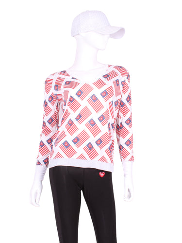 All soft yummy black fabric!  It’s called the Long Sleeve Very Vee Tee - because as you can see - the Vee is - well you know - VERY VEE!  For the tennis lady who loves to leave her chest open - but cover her arms (and other bits) this top is seductive in a sweet way!