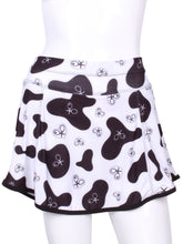 Load image into Gallery viewer,    This is our limited edition Gladiator Skirt CowPrint.  This piece has a silky soft and quick-drying matching shorties, and binding to match.  We make these in very small quantities - by design.  Unique.  Luxurious.  Comfortable.  Cool.  Fun.
