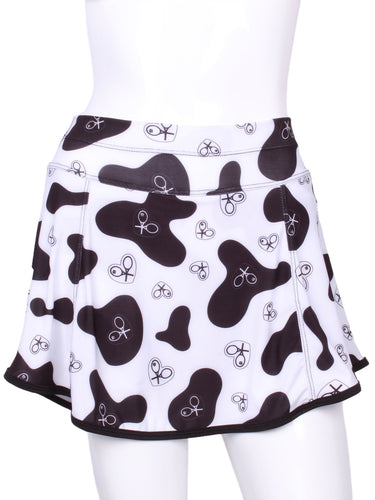    This is our limited edition Gladiator Skirt CowPrint.  This piece has a silky soft and quick-drying matching shorties, and binding to match.  We make these in very small quantities - by design.  Unique.  Luxurious.  Comfortable.  Cool.  Fun.