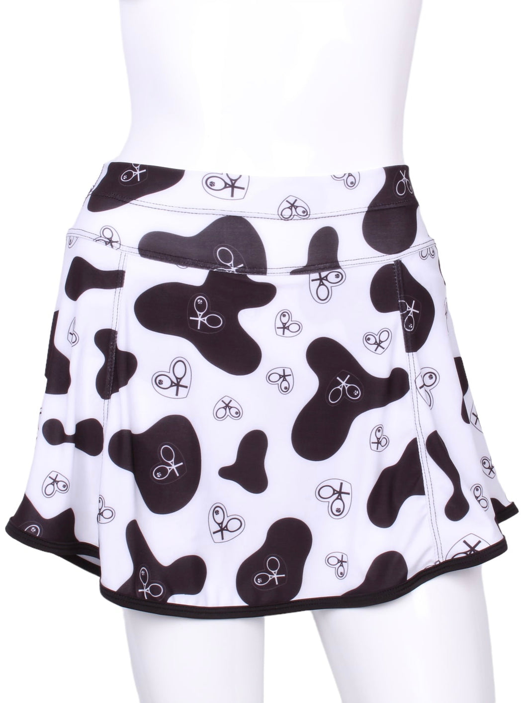    This is our limited edition Gladiator Skirt CowPrint.  This piece has a silky soft and quick-drying matching shorties, and binding to match.  We make these in very small quantities - by design.  Unique.  Luxurious.  Comfortable.  Cool.  Fun.