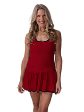 Load image into Gallery viewer, Meet my playful, fun, and very flirty tennis dress The Sandra Dee. I designed it just for you. A tennis player designing for tennis players!  Fits your desire to have a cute outfit, comfortable and sexy, and where you can keep your tennis balls off of your skin!  My exclusive back dry ball pocket looks like a cute tennis net - and more importantly, keeps the yellow fuzz off the thigh!
