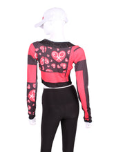 Load image into Gallery viewer, This vee neckline tops arm protection from the sun, but have mesh under the arm to keep you COOL while you play.   Designed very short to allow for access to the back pocket on my court to cocktails tennis dresses.
