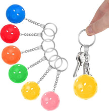 Load image into Gallery viewer, Super cute pickleball keyring! The Pickleball Keychain is made of alloy and will not rust, discolor or lose its luster. The ball is made of plastic and is durable and resistant to falling. Choose between multiple different colors. 
