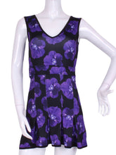 Load image into Gallery viewer, The Angelina Dress is modern yet classy.  This style is in our very limited Purple Pansy print, with a flattering v-neck neckline.  This soft, silky, and sexy tennis dress has an empire waist and a feminine skirt.
