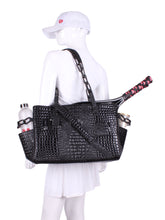 Load image into Gallery viewer, The Long Tennis Tote in Shiny Black Vegan Alligator is our stylish, sexy and functional tennis bag designed to carry all your essentials for the game. 
