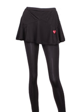 Load image into Gallery viewer, This is our limited edition Triangle Green Skirt with Black Leggings.  This piece has a silky soft and quick-drying and binding to match.  We make these in very small quantities - by design.
