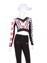 Load image into Gallery viewer, This vee neckline tops arm protection from the sun.  This piece has the Black Zig Zag and Red Heart + Rackets Trademarked Logo on a white background for a feminine and fun print.  Very limited edition only two made per size per style.
