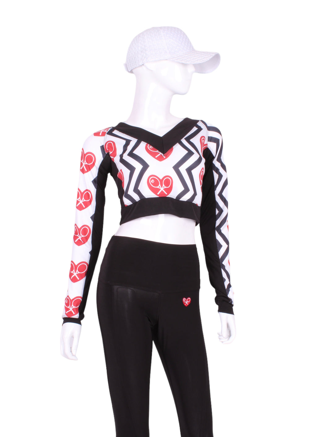 This vee neckline tops arm protection from the sun.  This piece has the Black Zig Zag and Red Heart + Rackets Trademarked Logo on a white background for a feminine and fun print.  Very limited edition only two made per size per style.