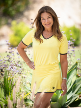 Load image into Gallery viewer, UNISEX! Yellow Vee neck short sleeve t-shirt.  Super soft and comfortable fabric. A cute T-Shirt with our logo on the left shoulder.  Feel confident and stay cool on the court together with your doubles partner. Comes in multiple colors!
