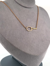 Load and play video in Gallery viewer, This choker necklace has a horizontal solid 14k yellow gold 1&quot; racket with loads of Diamonds!  With the dainty and very fancy shiny gold chain.  The length is 17&quot;.  This racket design is exclusively mine and hand crafted by a team in downtown Los Angeles.
