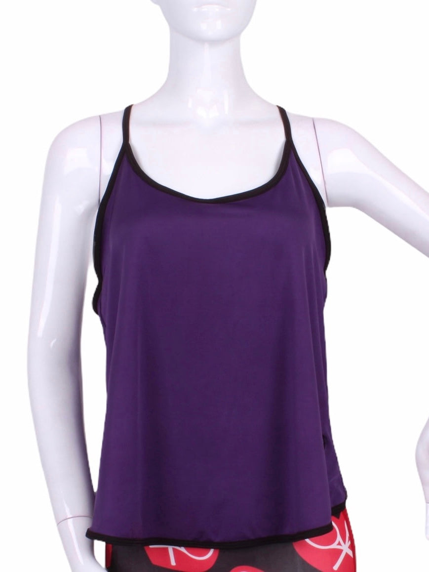 A cool and flowy Baggy Tank tennis top for ultimate comfort.  A deep scoop neckline front and strappy high back with two-needle cover stitch at each seam.   Smooth black binding finishes the edges.