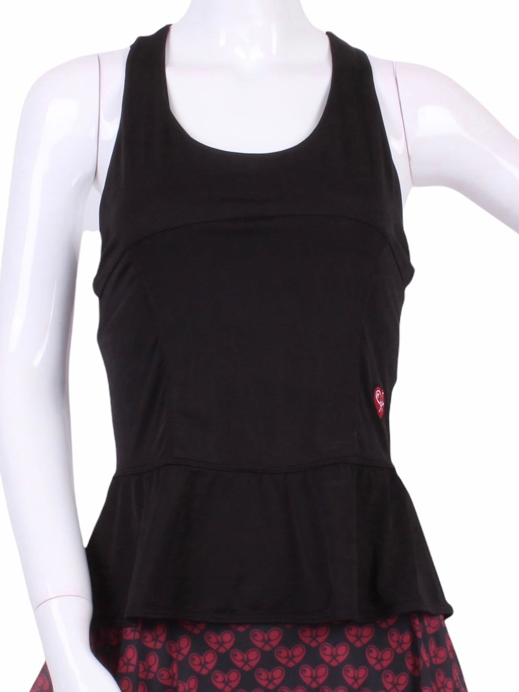 An elegant tennis ruffle top - silky soft - light - and quick-drying breathable fabric.   Scoop neckline front and crossed back with two-needle cover stitch at each seam.   Smooth binding finishes the edges with class.  The most comfortable and feminine tennis top.  These pieces run small for a more petite woman - under 5’8” - for the medium max 34 D
