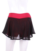 Load image into Gallery viewer, This limited Black Mesh LOVE &quot;O&quot; Skirt has shorties underneath and NO seams on the &quot;O&quot;!  It&#39;s cut like a doughnut to show and move beautifully as you play.  The fabric is uber soft and light - it dries quickly - and protects from UV rays too.  This skirt has a “nearly naked” feel about it.  The embroidery Heart is Red + Black Rackets and the ball is Black to match the skirt.  Sleek black thread and binding.

