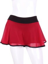 Load image into Gallery viewer, This limited Red Mesh LOVE &quot;O&quot; Skirt has shorties underneath and NO seams on the &quot;O&quot;!  It&#39;s cut like a doughnut to show and move beautifully as you play.  The fabric is uber soft and light - it dries quickly - and protects from UV rays too.  This skirt has a “nearly naked” feel about it.  The embroidery Heart is Black + Rackets and the ball is Red to match the skirt.  Sleek black thread and binding.
