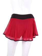Load image into Gallery viewer, This limited Red Mesh LOVE &quot;O&quot; Skirt has shorties underneath and NO seams on the &quot;O&quot;!  It&#39;s cut like a doughnut to show and move beautifully as you play.  The fabric is uber soft and light - it dries quickly - and protects from UV rays too.  This skirt has a “nearly naked” feel about it.  The embroidery Heart is Black + Rackets and the ball is Red to match the skirt.  Sleek black thread and binding.
