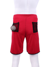 Load image into Gallery viewer, This is our limited edition Short Men’s Shorts Red.  This piece has a silky and soft fabric.   We make these in very small quantities - by design.  Unique.  Luxurious.  Comfortable.  Cool.  Fun.
