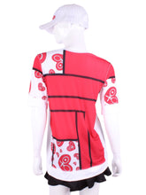 Load image into Gallery viewer, Mondrian Baggy Vee Tee The very comfortable Baggy Vee Tee is so cool and easy to wear. For the lady that likes a little room when she plays - the feminine top is flowing in the air. This Mondrian on a white background has a white stripe down the sides, hem, collar, and cuff.
