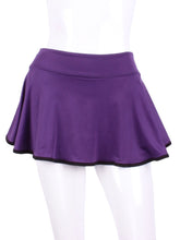 Load image into Gallery viewer, This limited Purple LOVE &quot;O&quot; Skirt has shorties underneath and NO seams on the &quot;O&quot;!  It&#39;s cut like a doughnut to show and move beautifully as you play.  The fabric is uber soft and light - it dries quickly - and protects from UV rays too.  This skirt has a “nearly naked” feel about it.  The embroidery Heart is Black + Rackets and Ball Purple to match the skirt.  Sleek black thread and binding.
