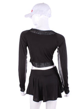 Load image into Gallery viewer, This vee neckline tops arm protection from the sun, but have fine mesh under the arm to keep you COOL while you play.    Designed very short to allow for access to the back pocket on my court to cocktails tennis dresses.
