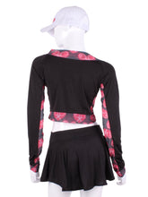 Load image into Gallery viewer, Black Vee Crop Top with Heart Mesh Trim. This vee neckline tops arm protection from the sun, but have mesh under the arm to keep you COOL while you play.  These beautiful tops have the Heart + Rackets (trademarked) logo as the contrast.  Designed very short to allow for access to the back pocket on my court to cocktails tennis dresses.  Hand sewn in Los Angeles.
