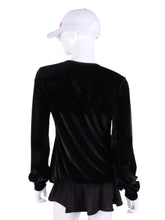 Load image into Gallery viewer, Black Velvet Long Sleeve Warm Up Top. This long sleeve top is the most feminine and flowing of my collection.  It is comfortable with binding on the neckline, poofy at the wrists and soft hem at the hips.  The fabrics are super soft yet warm.    Fully machine washable. Hang to dry.  Designed by Adeline, and proudly sewn in Los Angeles from lovely imported fabric.
