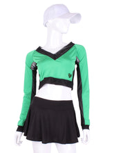 Load image into Gallery viewer, Green + Black Mesh Vee Crop Top. This vee neckline tops arm protection from the sun, but have mesh under the arm to keep you COOL while you play.  These beautiful tops have the Heart + Rackets (trademarked) logo as the contrast.  Designed very short to allow for access to the back pocket on my court to cocktails tennis dresses.  Hand sewn in Los Angeles.
