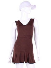 Load image into Gallery viewer, The Angelina Dress is from our sophisticated and elegant collections, for women with a flair for looking good.   Wear this stunning piece straight from the court....to cocktails.  This style is in our chocolate brown design, with a flattering v-neck neckline.  This soft, silky, and sexy tennis dress is lightweight, and very comfortable, providing plenty of flexibility to play both on and off of the court.
