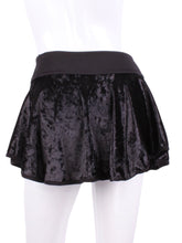 Load image into Gallery viewer, This is our limited edition Crushed Black Velvet LOVE “O” Skirt!  Each Skirt is hand cut in ONE PIECE with no side seams!  It flows as you twirl on the court.  (And we LOVE receiving “slow motion” videos of our clients doing the #tennistwirl on Instagram @ilovemydoublespartner)  This piece has a silky soft and quick drying black waistband, shorties and binding to match.  We make these in very small quantities - by design.  Unique.  Luxurious.  Comfortable.  Cool.  Fun.
