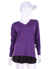 Load image into Gallery viewer, Purple Long Sleeve Very Vee Tee. It’s called the Long Sleeve Very Vee Tee - because as you can see - the Vee is - well you know - VERY VEE!  For the tennis lady who loves to leave her chest open - but cover her arms (and other bits) this top is seductive in a sweet way!  You feel nearly naked in it.  So go ahead - hit that ace!  Flattering and free - that’s what this top is.  The most preppy of my tops - looks just as good tied around the shoulders as it does on.
