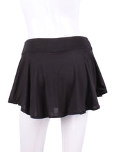 Load image into Gallery viewer, This limited Black LOVE &quot;O&quot; Skirt has shorties underneath and NO seams on the &quot;O&quot;!  It&#39;s cut like a doughnut to show and move beautifully as you play.  The fabric is uber soft and light - it dries quickly - and protects from UV rays too.  This skirt has a “nearly naked” feel about it.  The embroidery Heart is Red + Rackets and Ball Black to match the mesh.  Sleek black thread on the binding.
