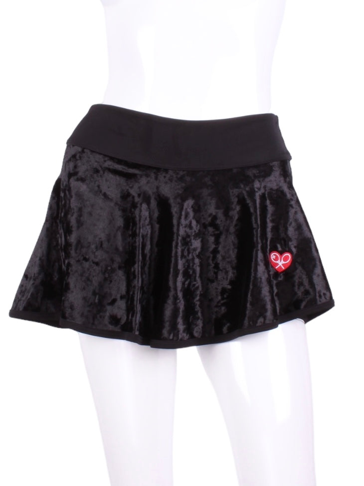 This is our limited edition Crushed Black Velvet LOVE “O” Skirt!  Each Skirt is hand cut in ONE PIECE with no side seams!  It flows as you twirl on the court.  (And we LOVE receiving “slow motion” videos of our clients doing the #tennistwirl on Instagram @ilovemydoublespartner)  This piece has a silky soft and quick drying black waistband, shorties and binding to match.  We make these in very small quantities - by design.  Unique.  Luxurious.  Comfortable.  Cool.  Fun.